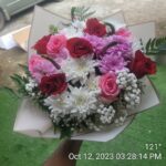 Mix bouquet of roses and other flowers