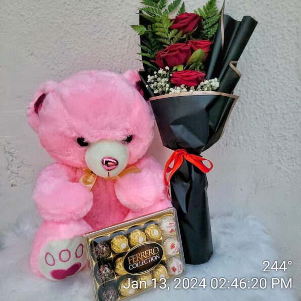 50cm teddy bear chocolate and 5 stems of Red roses.